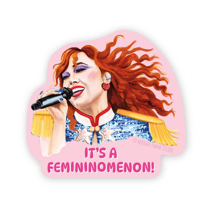 A sticker depicting a stylized woman with red hair singing into a microphone, with the text 'IT'S A FEMININOMENON!' across the bottom.